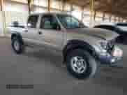 2001 Toyota Tacoma PreRunner z VIN 5TEGN92N71Z859665, wystawiony jako Copart lot #84799325 z przebiegiem 202 008 mil mil oraz Szkoda całkowita • Salvage title. Historia ofert i sprzedaży dostępna na DreamBid. Obrazek 4.