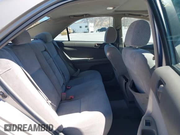 2004 Toyota Camry LE z VIN 4T1BF32K74U067244, wystawiony jako IAAI lot #43162095 z przebiegiem 370 818 mil mil oraz . Historia ofert i sprzedaży dostępna na DreamBid. Obrazek 8.