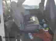 2005 Chevrolet Astro z VIN 1GNDM19X55B128751, wystawiony jako Copart lot #88860595 z przebiegiem Nie podano mil oraz Szkoda całkowita • Salvage title. Historia ofert i sprzedaży dostępna na DreamBid. Obrazek 12.