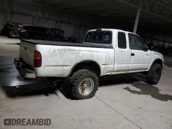 1997 Toyota Tacoma z VIN 4TAWN72N0VZ221965, wystawiony jako Copart lot #54206905 z przebiegiem 105 137 mil mil oraz Szkoda całkowita • Salvage title. Historia ofert i sprzedaży dostępna na DreamBid. Obrazek 3.