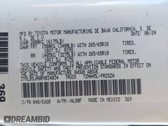 2024 Toyota Tacoma SR5 with VIN 3TMLB5JN8RM034034, listed as a IAAI auction lot 41253779 with 21,448 mi miles and . Bid and sale history available at DreamBid. Image 9.