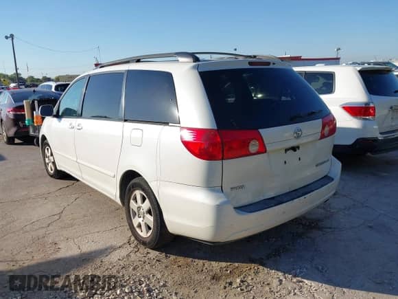 2009 Toyota Sienna XLE with VIN 5TDZK22CX9S232491, listed as a IAAI auction lot 43389674 with 298,733 mi miles and . Bid and sale history available at DreamBid. Image 3.