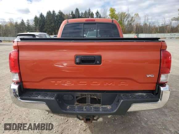 2016 Toyota Tacoma SR5 with VIN 5TFSZ5ANXGX008677, listed as a Copart auction lot 90244415 with 98,772 mi miles and Salvage title. Bid and sale history available at DreamBid. Image 6.