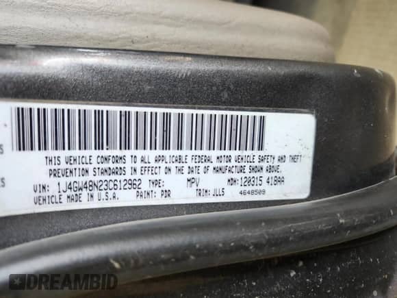 2003 Jeep Grand Cherokee Laredo with VIN 1J4GW48N23C612962, listed as a Copart auction lot 87071755 with 257,670 mi miles and Salvage title. Bid and sale history available at DreamBid. Image 14.