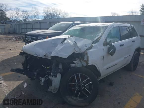 2021 Jeep Grand Cherokee Limited with VIN 1C4RJEBG9MC629630, listed as a IAAI auction lot 41273124 with 107,704 mi miles and . Bid and sale history available at DreamBid. Image 2.
