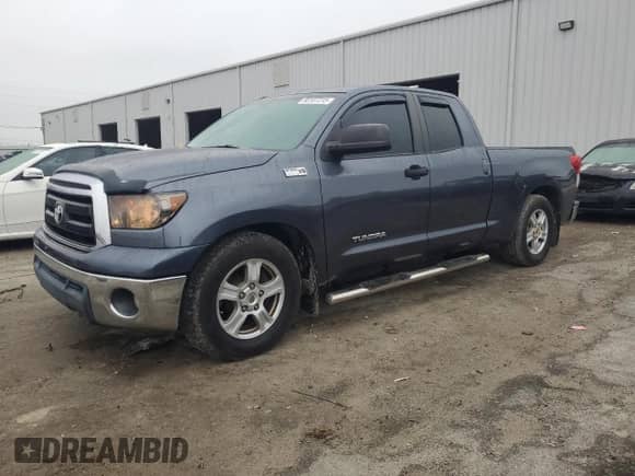 2010 Toyota Tundra с VIN 5TFRY5F16AX086274, выставлен на аукционе Copart как лот 90107315 с пробегом 138 549 миль миль и Списание • Salvage title. История ставок и продаж доступна на DreamBid. Изображение 1.