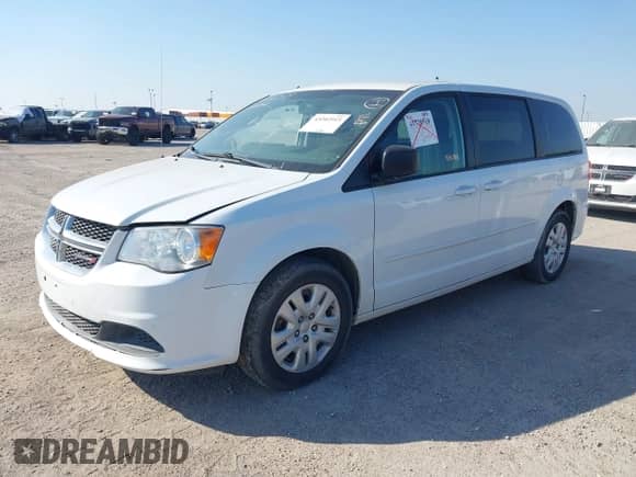 2015 Dodge Grand Caravan American Value z VIN 2C4RDGBG7FR658458, wystawiony jako IAAI lot #43202915 z przebiegiem 234 864 mil mil oraz . Historia ofert i sprzedaży dostępna na DreamBid. Obrazek 2.