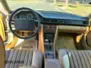 1986 Mercedes-Benz 300 E z VIN WDBEA30DXGA214357, wystawiony jako Copart lot #87459605 z przebiegiem 169 683 mil mil oraz Czysty tytuł • Clean title. Historia ofert i sprzedaży dostępna na DreamBid. Obrazek 9.