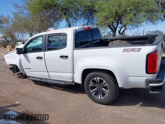 2021 Chevrolet Colorado 4WD Z71 z VIN 1GCGTDEN4M1257292, wystawiony jako IAAI lot #43368583 z przebiegiem 67 924 mil mil oraz . Historia ofert i sprzedaży dostępna na DreamBid. Obrazek 15.