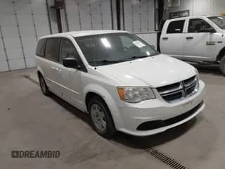 2012 Dodge Grand Caravan American Value z VIN 2C4RDGBG0CR190231, wystawiony jako IAAI lot #43140675 z przebiegiem 167 855 mil mil oraz . Historia ofert i sprzedaży dostępna na DreamBid. Obrazek 1.
