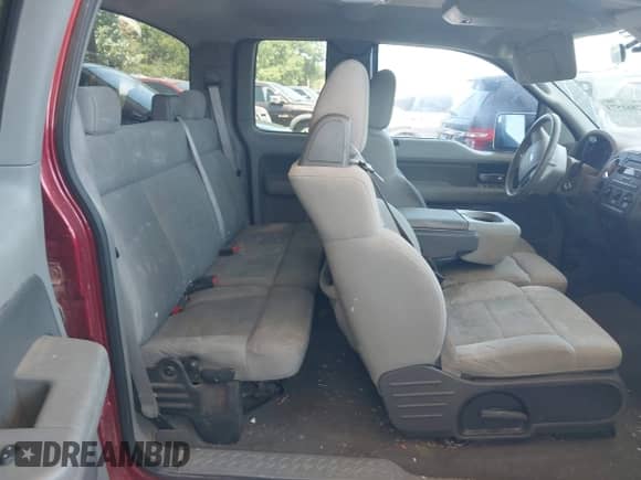 2007 Ford F-150 STX with VIN 1FTRX12W47NA02793, listed as a IAAI auction lot 42861573 with Not provided miles and . Bid and sale history available at DreamBid. Image 8.