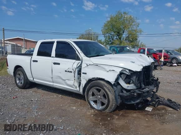 2012 Ram 1500 Express z VIN 1C6RD6KT4CS157701, wystawiony jako IAAI lot #43211967 z przebiegiem 189 672 mil mil oraz . Historia ofert i sprzedaży dostępna na DreamBid. Obrazek 13.