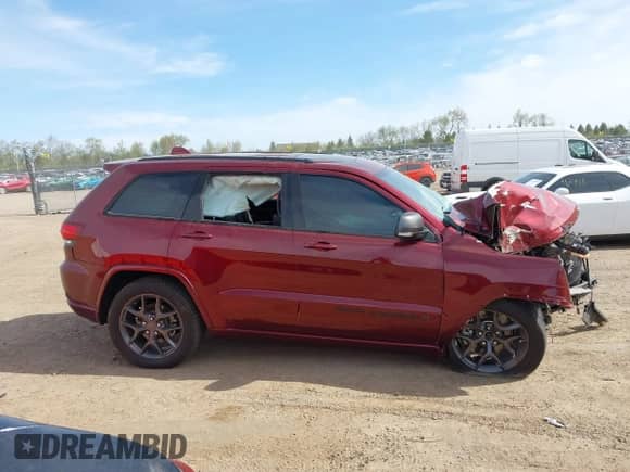 2021 Jeep Grand Cherokee Limited with VIN 1C4RJFBG2MC858107, listed as a IAAI auction lot 42144436 with Not provided miles and . Bid and sale history available at DreamBid. Image 14.