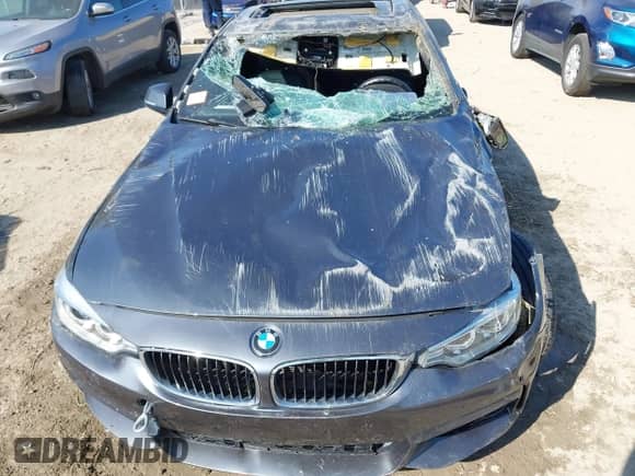 2016 BMW 4 Series 428i z VIN WBA4A9C55GGL87475, wystawiony jako IAAI lot #43233792 z przebiegiem 70 137 mil mil oraz . Historia ofert i sprzedaży dostępna na DreamBid. Obrazek 6.