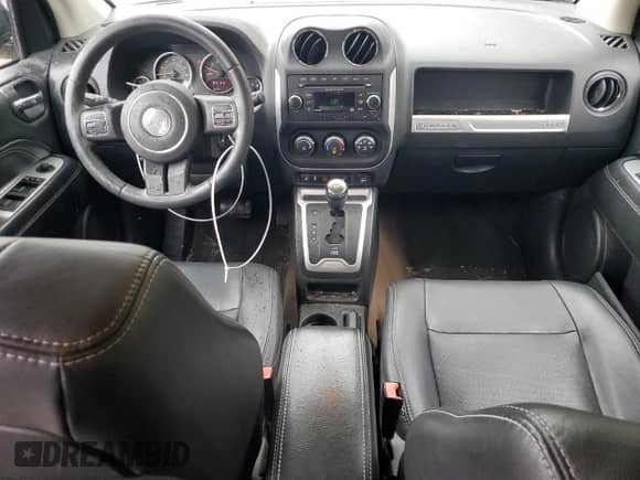2014 Jeep Compass Latitude with VIN 1C4NJCEA5ED732288, listed as a Copart auction lot 82689185 with 102,856 mi miles and Clean title. Bid and sale history available at DreamBid. Image 8.