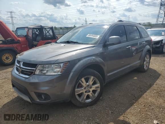 2012 Dodge Journey Crew with VIN 3C4PDCDG1CT204552, listed as a Copart auction lot 66494005 with 145,067 mi miles and Salvage title. Bid and sale history available at DreamBid. Image 1.