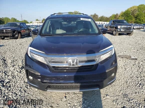 2022 Honda Pilot Touring 7-Passenger with VIN 5FNYF5H64NB017528, listed as a Copart auction lot 53305405 with 64,651 mi miles and Salvage title. Bid and sale history available at DreamBid. Image 5.