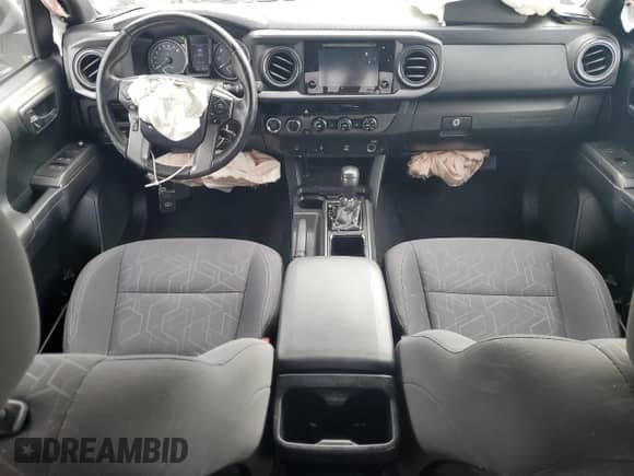 2016 Toyota Tacoma SR z VIN 3TMCZ5AN5GM020956, wystawiony jako Copart lot #80021725 z przebiegiem 106 368 mil mil oraz Szkoda całkowita • Salvage title. Historia ofert i sprzedaży dostępna na DreamBid. Obrazek 8.