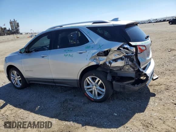 2018 Chevrolet Equinox Premier с VIN 2GNAXWEXXJ6330141, выставлен на аукционе Copart как лот 71128485 с пробегом 91 725 миль миль и Списание • Salvage title. История ставок и продаж доступна на DreamBid. Изображение 2.