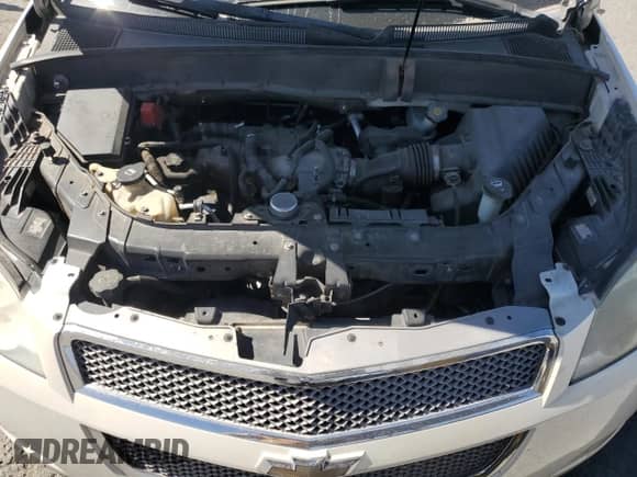 2011 Chevrolet Traverse LTZ с VIN 1GNKVLEDXBJ346911, выставлен на аукционе Copart как лот 67268845 с пробегом Не указан миль и Списание • Salvage title. История ставок и продаж доступна на DreamBid. Изображение 12.