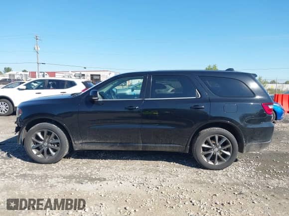 2018 Dodge Durango GT with VIN 1C4RDJDG7JC415762, listed as a IAAI auction lot 43313303 with 137,834 mi miles and . Bid and sale history available at DreamBid. Image 15.