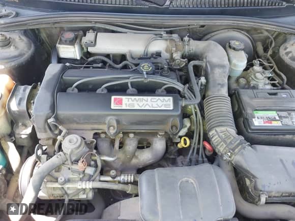 1999 Saturn SL z VIN 1G8ZK5274XZ304652, wystawiony jako IAAI lot #42618620 z przebiegiem 98 131 mil mil oraz . Historia ofert i sprzedaży dostępna na DreamBid. Obrazek 10.