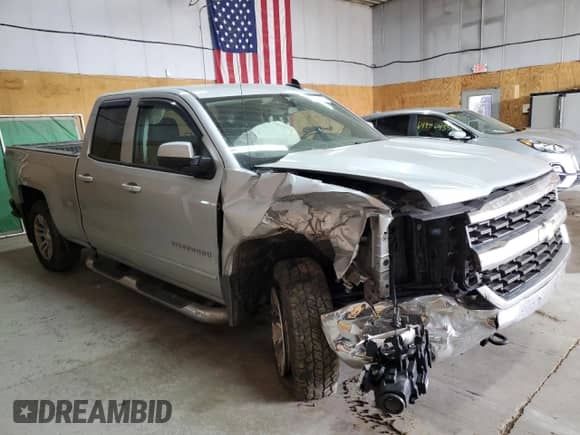 2018 Chevrolet Silverado 1500 LT с VIN 1GCVKRECXJZ104953, выставлен на аукционе Copart как лот 64834705 с пробегом 153 834 миль миль и Списание • Salvage title. История ставок и продаж доступна на DreamBid. Изображение 4.