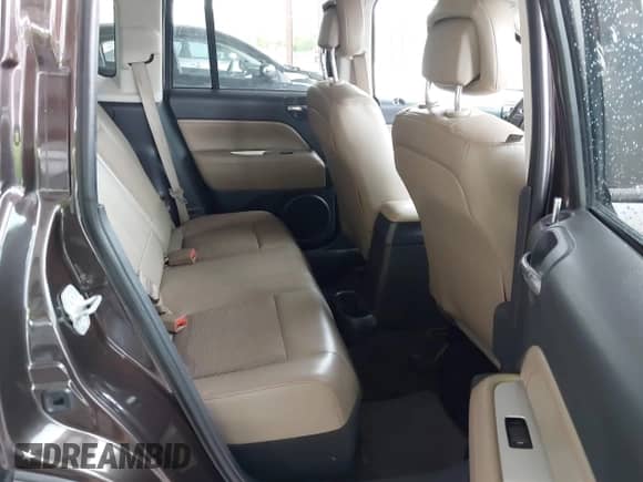 2014 Jeep Compass Latitude with VIN 1C4NJCEB5ED691041, listed as a IAAI auction lot 43112471 with 117,596 mi miles and . Bid and sale history available at DreamBid. Image 8.