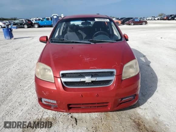 2007 Chevrolet Aveo LS z VIN KL1TD56617B051863, wystawiony jako Copart lot #79996804 z przebiegiem Nie podano mil oraz Szkoda całkowita • Salvage title. Historia ofert i sprzedaży dostępna na DreamBid. Obrazek 5.