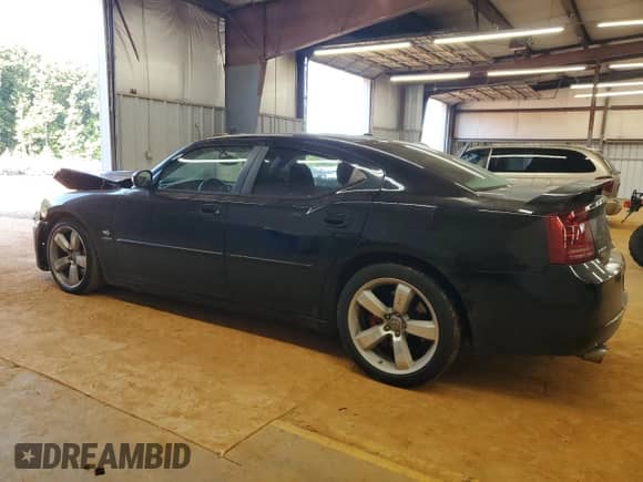 2007 Dodge Charger SRT-8 with VIN 2B3KA73W67H652417, listed as a Copart auction lot 70518705 with 75,440 mi miles and Salvage title. Bid and sale history available at DreamBid. Image 2.