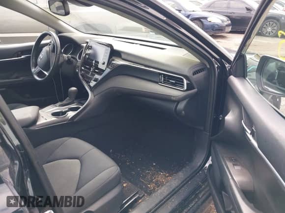 2023 Toyota Camry LE z VIN 4T1R11AK7PU130043, wystawiony jako IAAI lot #43289865 z przebiegiem 24 472 mil mil oraz . Historia ofert i sprzedaży dostępna na DreamBid. Obrazek 5.