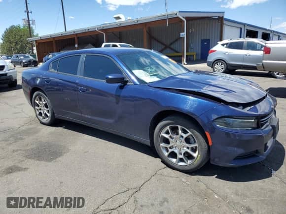 2015 Dodge Charger SE with VIN 2C3CDXFG3FH815378, listed as a Copart auction lot 57861125 with 135,452 mi miles and Salvage title. Bid and sale history available at DreamBid. Image 4.