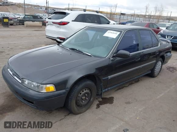 1991 Honda Accord LX z VIN JHMCB7653MC090847, wystawiony jako IAAI lot #41561641 z przebiegiem 163 258 mil mil oraz . Historia ofert i sprzedaży dostępna na DreamBid. Obrazek 2.