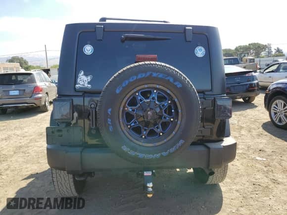 2018 Jeep Wrangler Sport S with VIN 1C4GJWAGXJL811914, listed as a Copart auction lot 65130075 with 88,622 mi miles and Salvage title. Bid and sale history available at DreamBid. Image 6.
