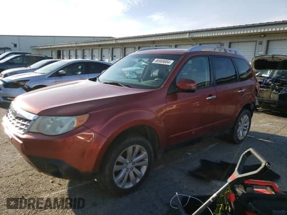 2011 Subaru Forester z VIN JF2SHBHC6BH700347, wystawiony jako Copart lot #86969884 z przebiegiem 222 214 mil mil oraz Szkoda całkowita • Salvage title. Historia ofert i sprzedaży dostępna na DreamBid. Obrazek 1.