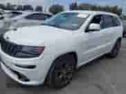 2014 Jeep Grand Cherokee SRT-8 z VIN 1C4RJFDJ7EC536055, wystawiony jako IAAI lot #42194498 z przebiegiem 80 241 mil mil oraz . Historia ofert i sprzedaży dostępna na DreamBid. Obrazek 2.