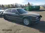 1999 BMW 7 Series 740iL with VIN WBAGH833XXDP05481, listed as a Copart auction lot 85510534 with 159,680 mi miles and Salvage title. Bid and sale history available at DreamBid. Image 4.