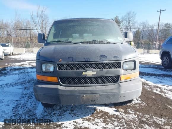 2014 Chevrolet Express Cargo with VIN 1GCWGGBA5E1205786, listed as a IAAI auction lot 41339085 with 201,460 mi miles and . Bid and sale history available at DreamBid. Image 6.