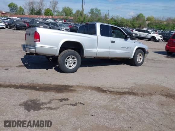 2001 Dodge Dakota with VIN 1B7GG22XX1S348751, listed as a IAAI auction lot 42077395 with 148,034 mi miles and . Bid and sale history available at DreamBid. Image 4.