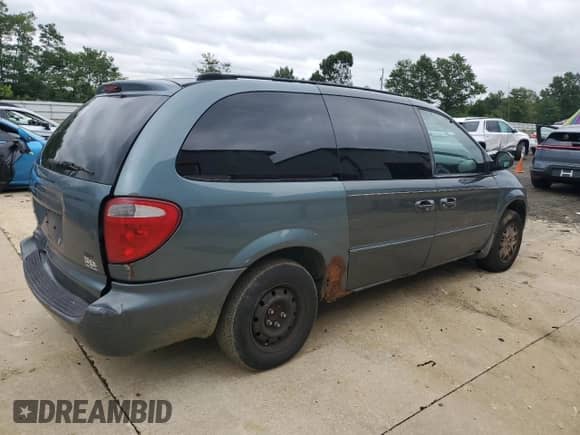 2006 Dodge Grand Caravan SXT with VIN 2D4GP44L86R612048, listed as a Copart auction lot 69993115 with 197,974 mi miles and Salvage title. Bid and sale history available at DreamBid. Image 3.