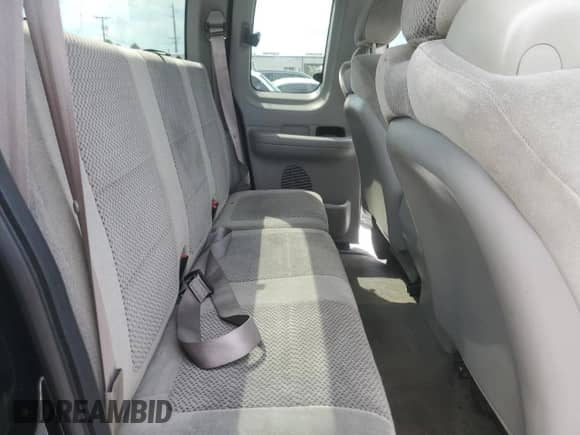 2001 Ford F-150 XL z VIN 1FTZX17231NB90039, wystawiony jako Copart lot #81103425 z przebiegiem 183 400 mil mil oraz Szkoda całkowita • Salvage title. Historia ofert i sprzedaży dostępna na DreamBid. Obrazek 10.