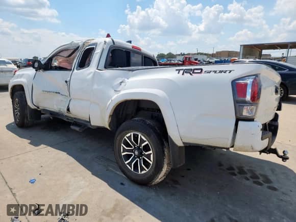 2023 Toyota Tacoma SR z VIN 3TYRZ5CN5PT033640, wystawiony jako Copart lot #69745075 z przebiegiem 14 471 mil mil oraz Szkoda całkowita • Salvage title. Historia ofert i sprzedaży dostępna na DreamBid. Obrazek 2.