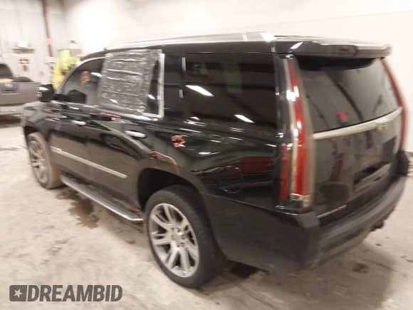 2016 Cadillac Escalade Luxury Collection z VIN 1GYS4BKJ5GR163144, wystawiony jako IAAI lot #41994857 z przebiegiem 187 042 mil mil oraz . Historia ofert i sprzedaży dostępna na DreamBid. Obrazek 3.