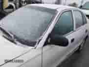 1999 Hyundai Accent GL z VIN KMHVF24N1XU583604, wystawiony jako IAAI lot #41613240 z przebiegiem 163 938 mil mil oraz . Historia ofert i sprzedaży dostępna na DreamBid. Obrazek 14.