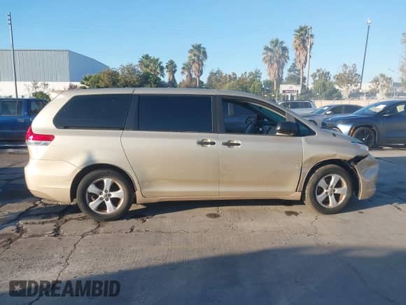 2014 Toyota Sienna L with VIN 5TDZK3DC0ES435998, listed as a IAAI auction lot 43475071 with 69,397 mi miles and . Bid and sale history available at DreamBid. Image 13.