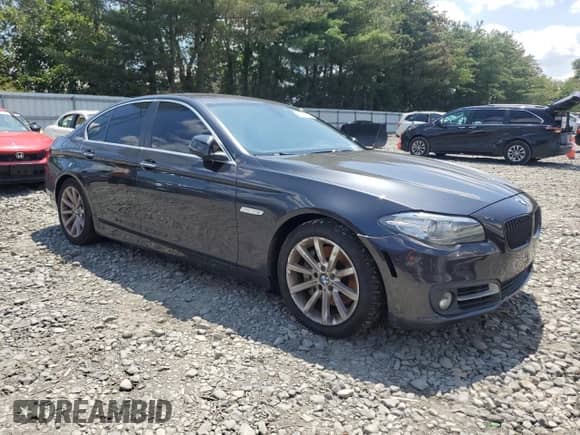 2015 BMW 5 Series 535i xDrive with VIN WBA5B3C52FD547312, listed as a Copart auction lot 66416015 with 134,895 mi miles and Salvage title. Bid and sale history available at DreamBid. Image 4.