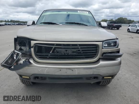 2000 GMC Sierra 1500 SLE z VIN 1GTEK14V3YZ132902, wystawiony jako Copart lot #83982915 z przebiegiem 187 430 mil mil oraz Czysty tytuł • Clean title. Historia ofert i sprzedaży dostępna na DreamBid. Obrazek 5.