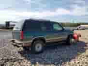 1996 Chevrolet Tahoe z VIN 3GNEK18R2TG107728, wystawiony jako Copart lot #80220555 z przebiegiem 176 207 mil mil oraz Czysty tytuł • Clean title. Historia ofert i sprzedaży dostępna na DreamBid. Obrazek 3.