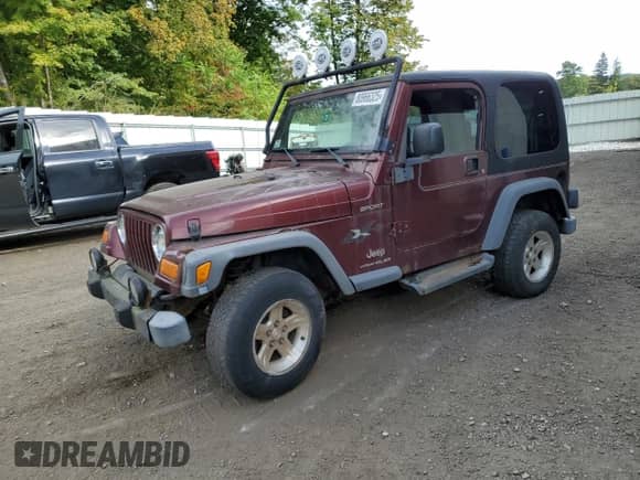 2004 Jeep Wrangler Sport z VIN 1J4FA49S94P714137, wystawiony jako Copart lot #80966325 z przebiegiem 142 534 mil mil oraz Czysty tytuł • Clean title. Historia ofert i sprzedaży dostępna na DreamBid. Obrazek 1.