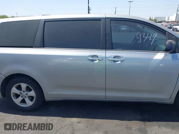 2014 Toyota Sienna L with VIN 5TDZK3DC6ES507187, listed as a IAAI auction lot 42544349 with 147,124 mi miles and . Bid and sale history available at DreamBid. Image 14.